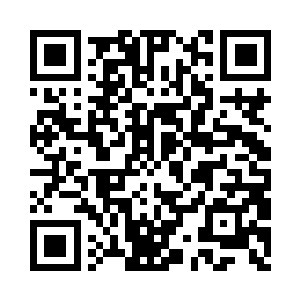 一个人在屋子中打算穿梭到火影世界中去二维码生成