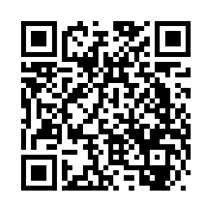 一个穿着十分时尚的男子走了进来二维码生成