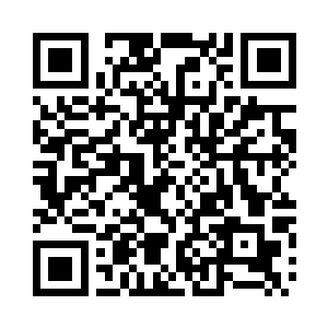 一个美女那时就在战馆大厅的服务台后面站着二维码生成