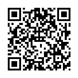 一位男子正好这时候从一间教室内走出来二维码生成