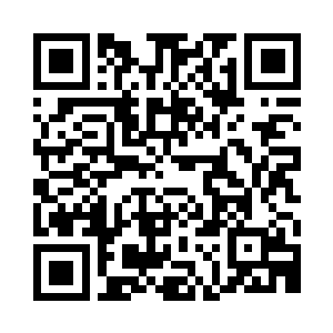 一只威猛凶悍的头颅位于青铜镜的正上方二维码生成