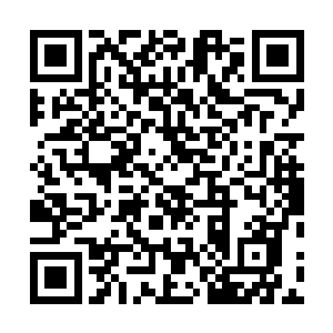 一如在泰坦尼克号上大喊着自己是世界之王的大男孩一般二维码生成