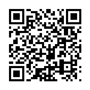 一座占地面积并不小的二层土楼就这么突兀地二维码生成