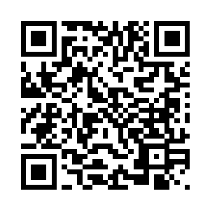 一张和蔼的老人面孔出现在植物上二维码生成