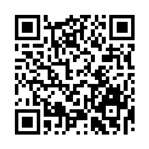 一边低头查看身上五行玄变甲中箭部位二维码生成