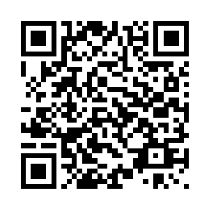 丁二狗看着坐在他对面的周红艳道二维码生成
