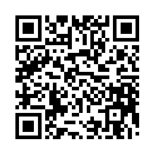 丁长生提着东西到了组织委员向刚的家里二维码生成