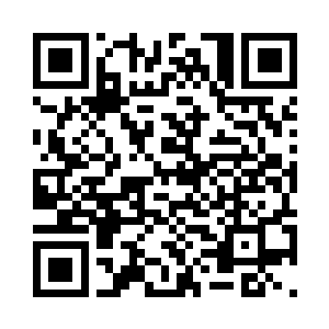 上面雕刻了很具有美感的雨打牡丹图二维码生成