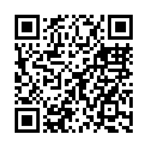 下意识的看向身边即将经过的一栋商楼二维码生成