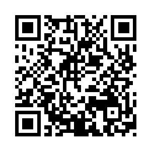 不过那个人坐在那里没有丝毫紧张的意思二维码生成