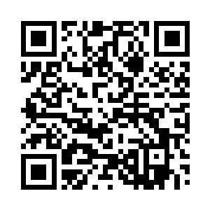 与坐在斜对过单人沙发上的科夫帕克道二维码生成