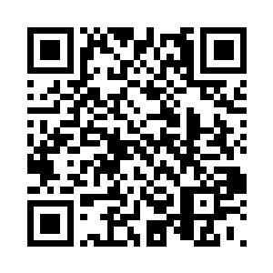 与当时面对苏茜怡的嚣张跋扈截然不同二维码生成