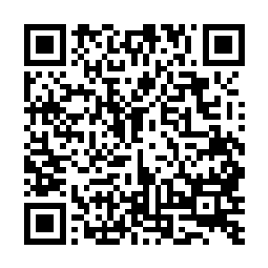 东边的天空因为稀薄的阳光染上仿佛带着暖意的淡黄色二维码生成