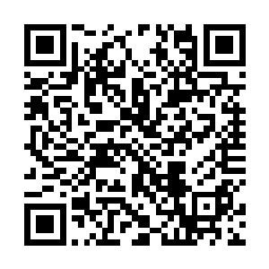 两个锦衣玉食的校尉血淋淋的人头就被挂在辕门外面了二维码生成