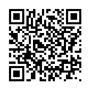 义尔正绕着扎木家的地基不停的行走二维码生成