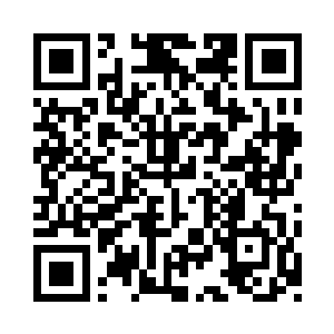 从后门的道路延伸着一条通往城市的道路二维码生成