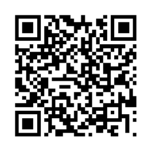 从里面费力的掏出了一个布包着的东西二维码生成