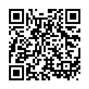 他吹动着飘浮在茶杯中的一片茶叶二维码生成