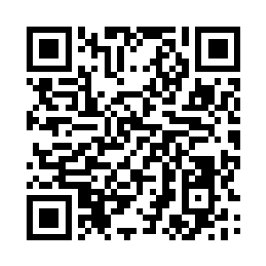 他就端坐在文红花同志身后的椅子上二维码生成