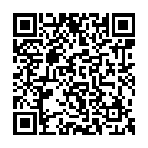 他就象是一个勤恳的农夫正在收割秋日里的麦穗二维码生成