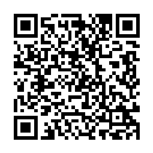 他用了一半的时候述说了下关镇这六十年的发展历程二维码生成