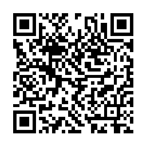 他衣衫褴褛浑身是伤奄奄一息地出现在了上海街头二维码生成