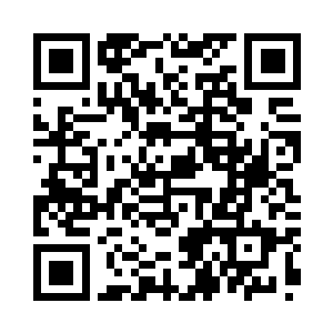 伍秀韵的双手紧紧的抱着自己的胳膊二维码生成