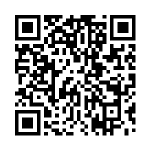 但是她的手指却在噼里啪啦敲击着操作键盘二维码生成