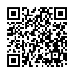 保镖甲用诧异的神情看着屏幕上的图像二维码生成