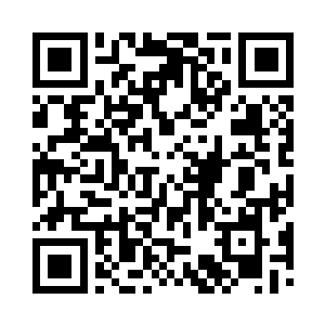 偶尔石峰中探出来的零星几株草木孤零零的二维码生成