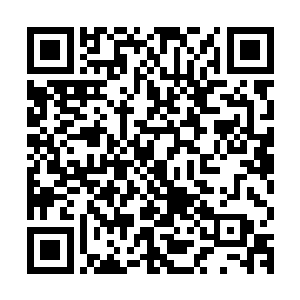 其实就算一直悬挂着蛛人部落朝向魔鬼城的一座洞穴的旗杆上头二维码生成
