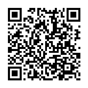 其表面是半个或者一个十分奇特的上古象形文字二维码生成