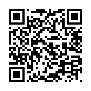 办公桌上经常摆满了翡翠照片和文件呢二维码生成