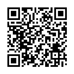 华宇集团的董事长徐宇州坐在沙发上二维码生成