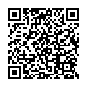 又如同飘浮在一片浊浪滔天的汪洋中的一叶扁舟二维码生成