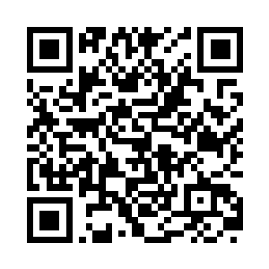 另一只手上还抓着几个闪烁着幽黑光芒的鬼晶二维码生成