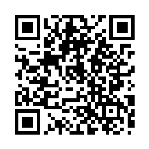 只不过现在这个身影不再是被捆绑着了二维码生成