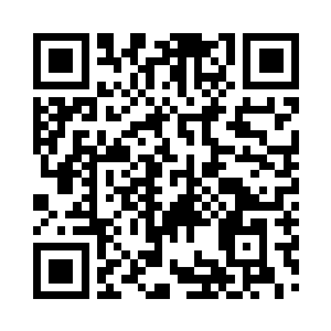 只有远处墙头的白色灯光照亮小小的区域二维码生成