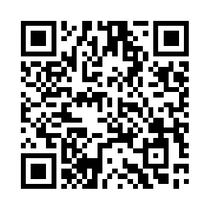可以看出他的双手扶住了自己两边的太阳穴上二维码生成