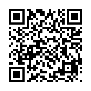 可是在她的脸上丝毫看不到疲倦的面容二维码生成