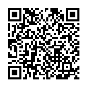 可能这个小孩子生前被人故意放置在了这个木箱子之中二维码生成