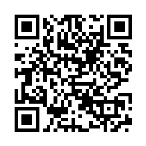 同事笑着安慰着明显不怎么高兴的哈里斯二维码生成