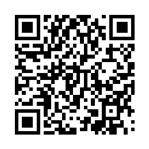 后面贴着荧光条的功能齐备标准背心二维码生成