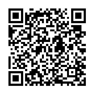 周围执勤的也都是穿着和林锐等人一样的黄色防护服二维码生成