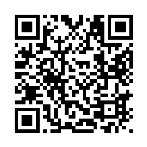 图片的中心是一枚仿椎形的核弹头二维码生成