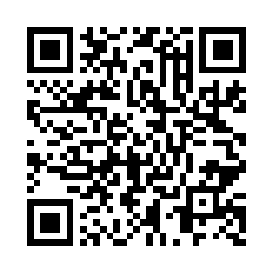 在他身旁还有着三名同样穿着黑西装的男子二维码生成