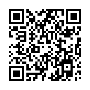 在土属性巨柱下方坐着一个如同石像的修士二维码生成