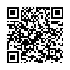 地委委员们都很热情的和鲍成钢握手二维码生成