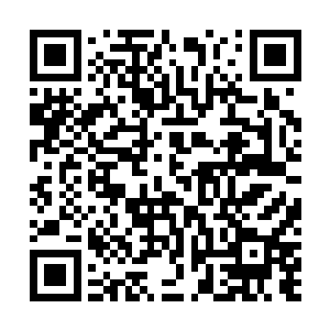 夜一等人在看到其中最大的一块石头所要掉落的地方之后二维码生成