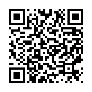 大门两侧的柱子上雕刻了精美的团二维码生成